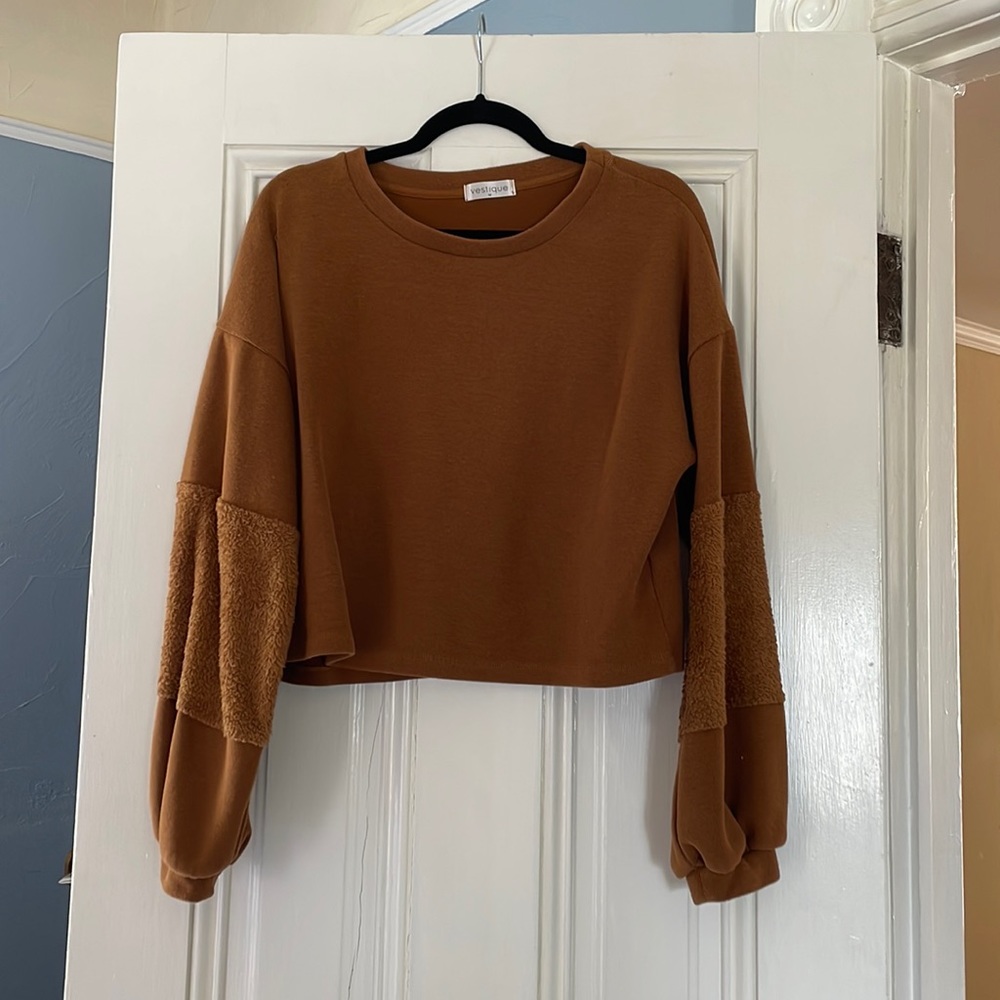 Rust colored long sleeve sweater
